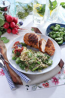 Grilled chicken breast with broad beans and quinoa