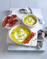 Pea soup with cream, sprouts and bacon