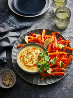 Vegetable sticks with ginger yogurt curry dip