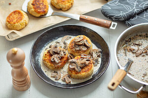 Potato and quark taler with mushroom sauce