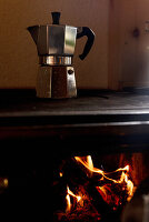 Espresso maker on traditional wood stove