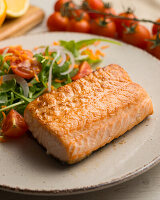 Grilled salmon fillet with fresh salad