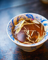 Tea with lemongrass in a traditional cup