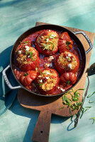 Stuffed ox heart tomatoes with couscous-chorizo mix from the oven