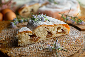 Sliced ensaimada from Mallorca sprinkled with icing sugar