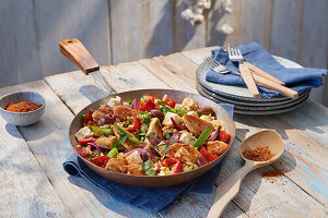 Crete pan with chicken, peppers, feta, olives and kritharaki