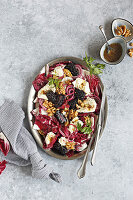 Radicchio salad with berries, mozzarella, red onions and walnuts