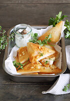 Filo pastry wedges with feta filling and dip