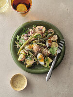 Healthy potato salad with beans and soft-boiled eggs
