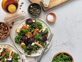 Root vegetable salad with kale, feta and seeds