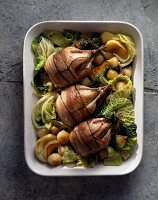 young partridge with bacon and green cabbage (topic: cabbage)