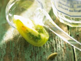 A quarter of a green tomato