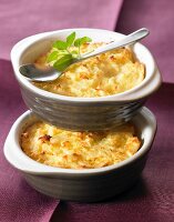 Mashed potatoes and fromage frais cheese-topped dish