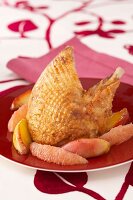 Duck's leg with grapefruit