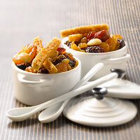 Small casserole dish of dried fruit with honey and gingerbread
