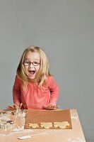 Young girl making cookies