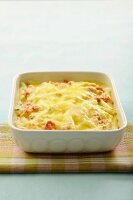 White asparagus and ham cheese-topped dish