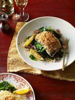 Baked cod fillet with blue cheese in olive and spinach crust