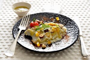 Fresh and mashed artichokes with hazelnuts, diced confit orange rinds, grated Emmental and paprika