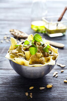 Farfalle with pesto,pine nuts and squash seeds