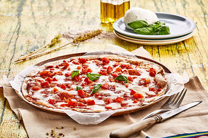 Tomato-mozzarella pizza