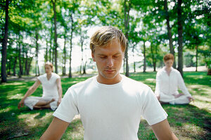 People Meditating in Park