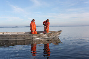 Inland fishermen on Lake Ploen in the morning, Ploen, Ostholstein, Schleswig-Holstein, Germany