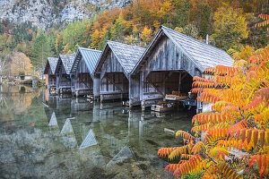 Wooden buildings on lakeshore in autumn in Gmunden, Upper Austria, Austria