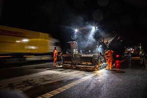 Night construction site A2, Hanover, express redevelopment, construction workers during roadway redevelopment, rutting removal, German autobahn,