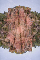 Double exposure of red rocks in the New Mexico landscape.