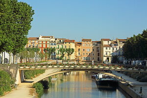  Pont des Marchants with merchant houses over the Canal de la Robine, Narbonne, Occitanie, France 