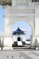  In the center of Taipei/Taiwan is the impressive Chiang Kai-shek Memorial Hall. Together with the surrounding park, it occupies a total area of 240,000 square meters. It was built between 1976 and 1980 in honor of the long-time president and supreme military commander of the Republic of China, Chiang Kai-shek (1878 - 1975). Here: View from the main gate to the main hall. 