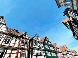  View from below of medieval half-timbered gables in Celle, Lower Saxony, Germany 