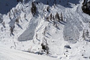  small avalanches in the ski area above Arabba, Veneto Dolomites, Italy, winter 