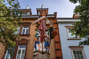  Hansel, historical figure of the Donaueschinger Fasnach on the Hanselbrunnen in Donaueschingen, Baden-Württemberg, Germany 