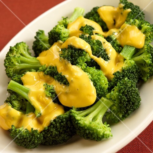 Serving Dish of Steamed Broccoli with Cheese Sauce buy images StockFood