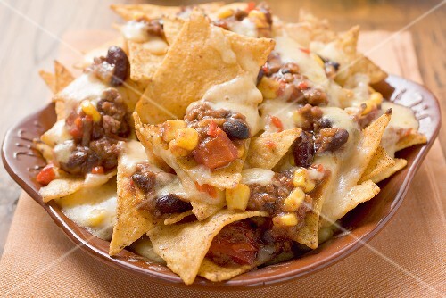 tortilla chips with meat and cheese