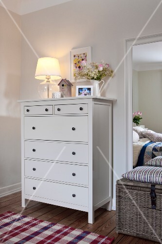 Bedroom In Scandinavian Style With Dresser Mirror And Drawer