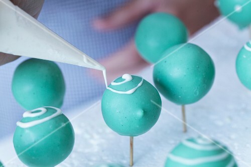 Turquoise Coloured Cake Pops Being License Images Stockfood