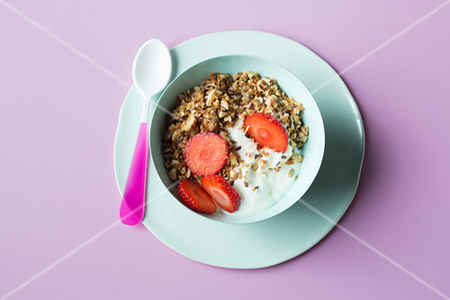 Crunchy nut muesli with raspberries and yoghurt (keto cuisine)