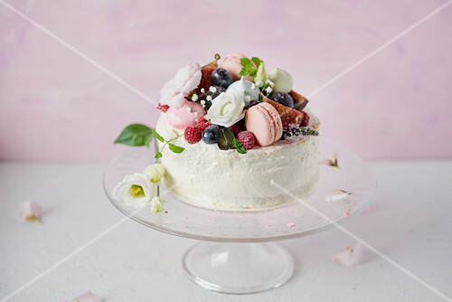 Festive Cake Decorated With Macarons And License Images